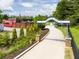 Inviting entrance to the Greenway Trail, offering a scenic path for walking and outdoor recreation at 240 Flowers Cove Ln, Lilburn, GA 30047