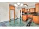 Well-lit kitchen showcasing granite countertops, custom cabinetry, and modern stainless steel appliances at 240 Flowers Cove Ln, Lilburn, GA 30047