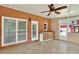 Enclosed patio with a sink, cabinets, and multiple access points at 240 Flowers Cove Ln, Lilburn, GA 30047