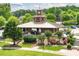 Community pavilion with clock tower, offering a shaded gathering space with landscaping and pedestrian walkways at 240 Flowers Cove Ln, Lilburn, GA 30047