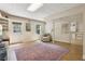 Finished basement featuring wood flooring, an egress door, and a comfortable seating area at 2819 Saddlebrook Nw Way, Marietta, GA 30064