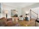 Welcoming foyer featuring hardwood floors, elegant staircase, and seamless flow into the living spaces at 2819 Saddlebrook Nw Way, Marietta, GA 30064