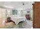 Spacious main bedroom features a tray ceiling, hardwood floors, and plenty of natural light at 2819 Saddlebrook Nw Way, Marietta, GA 30064