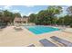 Community pool with diving board, chairs, and nearby community building at 2819 Saddlebrook Nw Way, Marietta, GA 30064