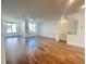 Open living space with hardwood floors, recessed lighting, and windows at 518 Healy Dr # 68, Cumming, GA 30040