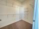 Walk-in closet with carpeted floor and wire shelving for organization at 518 Healy Dr # 68, Cumming, GA 30040