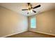 Bedroom with neutral walls, carpeted floors, and a ceiling fan at 690 Kimball Parc Way, Alpharetta, GA 30022