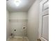 Utility room features laundry hookups and storage at 690 Kimball Parc Way, Alpharetta, GA 30022