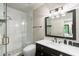 Modern bathroom with subway tile shower, glass door and contemporary vanity at 1430 N Harris Rdg, Atlanta, GA 30327