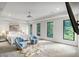 Bright bedroom with modern decor and large windows showcasing wooded views at 1430 N Harris Rdg, Atlanta, GA 30327