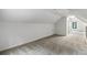 Attic space bedroom with carpet and a window view at 1430 N Harris Rdg, Atlanta, GA 30327