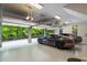 Spacious three-car garage with high-end vehicles parked inside at 1430 N Harris Rdg, Atlanta, GA 30327
