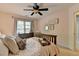 Charming bedroom with a window, curtains, and dresser at 2633 Hanriva Ct, Dacula, GA 30019