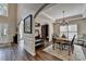 Elegant dining room with hardwood floors, chandelier, and natural light at 2633 Hanriva Ct, Dacula, GA 30019