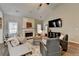 Cozy living room with a fireplace, hardwood floors, and neutral decor at 2633 Hanriva Ct, Dacula, GA 30019