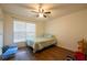 Bright bedroom offers large windows and neutral decor, perfect for a comfortable and serene space at 305 Saddle Wood Dr, Canton, GA 30114