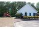 Community clubhouse features a playset, landscaping, and ample parking at 305 Saddle Wood Dr, Canton, GA 30114