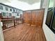 Private wooden deck offers outdoor living space with a privacy screen and railings at 532 Healy Dr # 61, Cumming, GA 30040