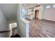 Bright open-concept living space leading to a spacious kitchen with modern appliances and island at 532 Healy Dr # 61, Cumming, GA 30040