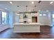Modern kitchen featuring a center island, stainless steel appliances, and a sleek minimalist design at 532 Healy Dr # 61, Cumming, GA 30040