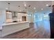 Bright and airy living room with recessed lighting, hardwood floors, and an open floor plan at 532 Healy Dr # 61, Cumming, GA 30040