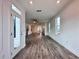 Spacious living room featuring new hardwood floors and a modern open concept design at 532 Healy Dr # 61, Cumming, GA 30040