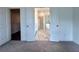 Bright main bathroom featuring marble floors, a soaking tub, and double doors at 532 Healy Dr # 61, Cumming, GA 30040