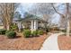 Picturesque community gazebo with stone accents, surrounded by mature trees and lush greenery at 730 Jackson Miller Cir, Powder Springs, GA 30127
