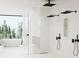 Contemporary bathroom featuring a luxurious tub, glass-enclosed shower, and sleek black fixtures at 2380 Greenglade Ne Rd, Atlanta, GA 30345