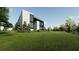 Contemporary home with expansive lawn, offering scenic views and a harmonious blend with nature at 2380 Greenglade Ne Rd, Atlanta, GA 30345