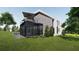 Modern two-story home features a covered porch, exterior patio, and an upper level balcony at 2380 Greenglade Ne Rd, Atlanta, GA 30345