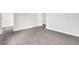 Spacious bedroom with plush carpeting, neutral walls and white trim at 3699 Broadwick Ln, Lithonia, GA 30038
