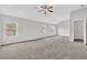 Bright main bedroom with windows and ceiling fan for added comfort at 3699 Broadwick Ln, Lithonia, GA 30038