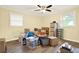 Bedroom featuring two windows and a ceiling fan at 4845 Willow St, Acworth, GA 30101
