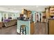 Inviting living area with bar counter, seamlessly blending living and dining spaces at 4845 Willow St, Acworth, GA 30101
