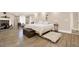 Expansive primary bedroom with stone fireplace and neutral decor at 4845 Willow St, Acworth, GA 30101