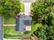Aerial view of a home featuring a stone patio and a lush green lawn at 600 Delphinium Nw Blvd, Acworth, GA 30102