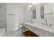 Bathroom with double sinks, marble countertop, gold hardware, and blue mosaic tiled floor at 600 Delphinium Nw Blvd, Acworth, GA 30102
