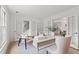 Bright home office featuring French doors, designer desk and decor, and plenty of natural light at 600 Delphinium Nw Blvd, Acworth, GA 30102