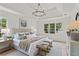 Bright and spacious main bedroom with a sitting area, neutral tones, and ample natural light at 600 Delphinium Nw Blvd, Acworth, GA 30102