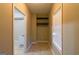Storage room with tile flooring, shelving, and window at 8245 Mill Run Trl, Whitesburg, GA 30185
