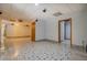 Finished basement showcasing decorative tile flooring, recessed lighting, and multiple entryways at 2436 Green Hollow Ct, Conyers, GA 30012