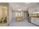 Bright kitchen featuring a center island and stainless steel appliances at 2436 Green Hollow Ct, Conyers, GA 30012