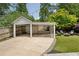 Backyard pergola with a fire pit area with seating, perfect for relaxing and entertaining at 1168 Mclynn Ne Ave, Atlanta, GA 30306