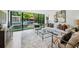 Bright living room showcasing a large window view of the pool area at 1168 Mclynn Ne Ave, Atlanta, GA 30306