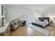 Serene main bedroom boasts ample natural light and a sitting area at 1168 Mclynn Ne Ave, Atlanta, GA 30306