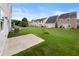 Spacious backyard with green grass, perfect for outdoor activities at 150 Chandler Trce, Covington, GA 30016