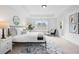 Spacious bedroom with neutral colored walls, carpeted floors, large window and natural lighting at 150 Chandler Trce, Covington, GA 30016
