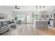 Open-concept living room and kitchen with modern appliances and stylish decor at 150 Chandler Trce, Covington, GA 30016
