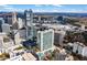 A detailed shot shows city structures, apartments, trees, and other buildings of the surrounding area at 3324 Peachtree Ne Rd # 1813, Atlanta, GA 30305